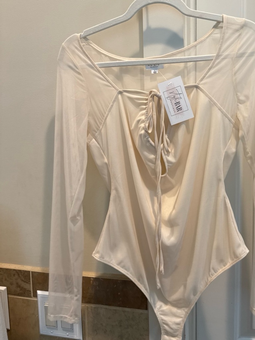 Cream Long-Sleeve Ruched Front Bodysuit